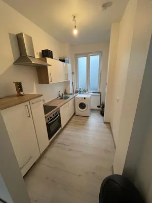 Küche/Küchenzeile in der Unterkunft Modernes City Apartment am Limbecker Platz Essen
