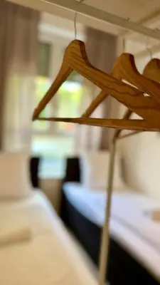 Ein Bett oder Betten in einem Zimmer der Unterkunft Perfect for fans and travelers