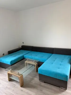 Ein Sitzbereich in der Unterkunft Red Dot Apartment Albert