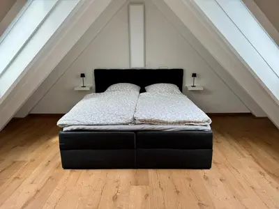 Ein Bett oder Betten in einem Zimmer der Unterkunft Seeblick trifft Kampmannbrücke - Dein Lieblingsplatz