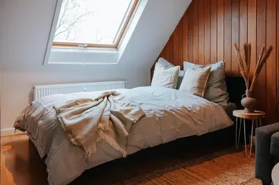 Ein Bett oder Betten in einem Zimmer der Unterkunft Rooftop-Apartment zentral gelegen in Düsseldorf