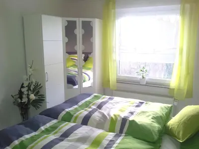 Ein Bett oder Betten in einem Zimmer der Unterkunft FeWo-Orsoyerberg