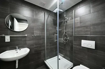 Ein Badezimmer in der Unterkunft BetonTraum Apartments