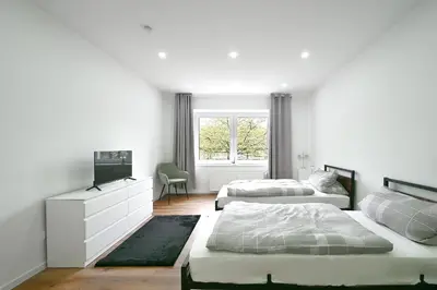 Ein Bett oder Betten in einem Zimmer der Unterkunft BetonTraum Apartments