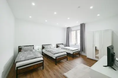 Ein Bett oder Betten in einem Zimmer der Unterkunft BetonTraum Apartment
