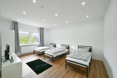 Ein Bett oder Betten in einem Zimmer der Unterkunft BetonTraum Apartment