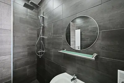 Ein Badezimmer in der Unterkunft BetonTraum Apartment