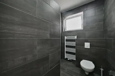Ein Badezimmer in der Unterkunft BetonTraum Apartment