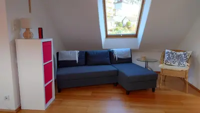 Ein Sitzbereich in der Unterkunft Bergisch Grün