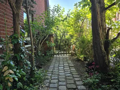 Ein Garten an der Unterkunft Gemütliche Doppelhaushälfte mit Garten