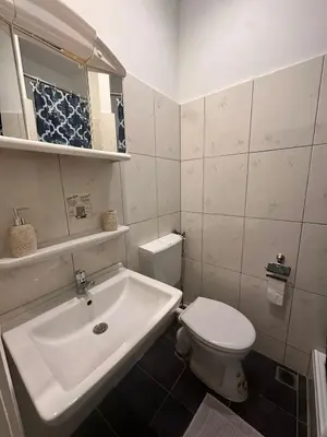 Ein Badezimmer in der Unterkunft Bach's Restaurant Bar Hotel
