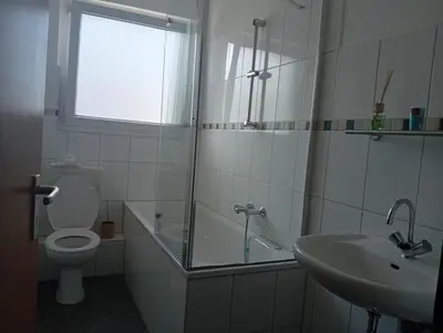 Ein Badezimmer in der Unterkunft Ferienwohnung