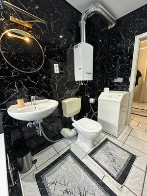 Ein Badezimmer in der Unterkunft Monteurswohnung am Schloss 2