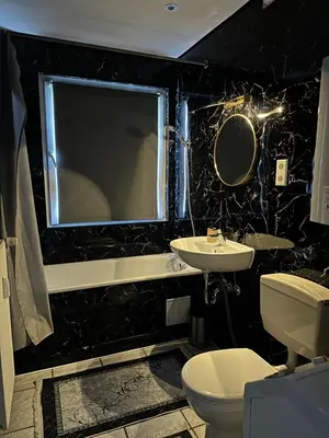 Ein Badezimmer in der Unterkunft Monteurswohnung am Schloss 2