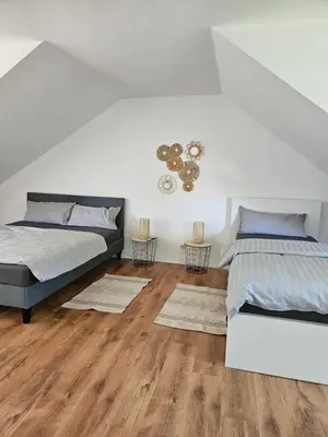 Ein Bett oder Betten in einem Zimmer der Unterkunft MaxMir - Ortlohn Iserlohn