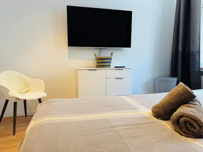 TV/Unterhaltungsangebot in der Unterkunft Modernes und großzügiges City-Apartment 66 qm - zentral und zum Wohlfühlen - Easy Stay Wuppertal