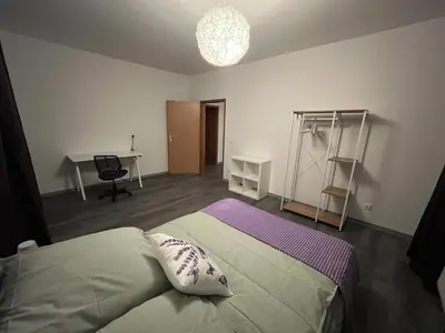 Ein Bett oder Betten in einem Zimmer der Unterkunft Lavendel Wohnung