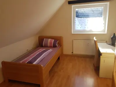 Ein Bett oder Betten in einem Zimmer der Unterkunft Monteurswohnung Langendreer
