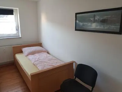Ein Bett oder Betten in einem Zimmer der Unterkunft Monteurswohnung Langendreer