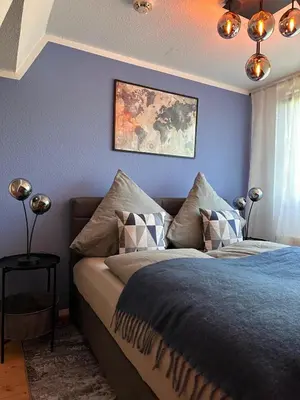 Ein Bett oder Betten in einem Zimmer der Unterkunft Dachnest mit Charme