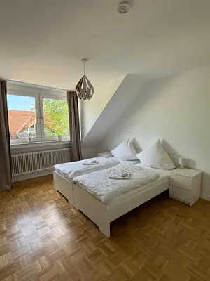 Ein Bett oder Betten in einem Zimmer der Unterkunft Bright apartment