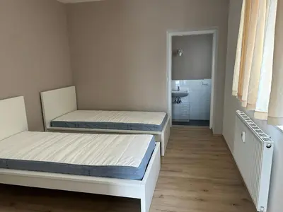 Ein Bett oder Betten in einem Zimmer der Unterkunft 1 Zimmer Wohnung Nähe Düsseldorf Zentrum