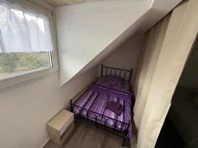 Ein Bett oder Betten in einem Zimmer der Unterkunft Haus Fröhlich