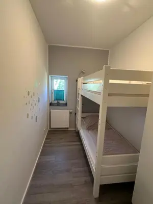 Ein Bett oder Betten in einem Zimmer der Unterkunft Ferienwohnung Sühling
