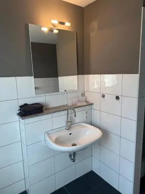 Ein Badezimmer in der Unterkunft Oase für Reisende & Geschäftsleute