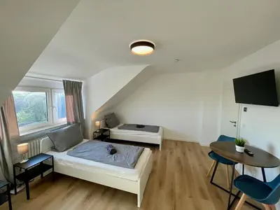 Ein Bett oder Betten in einem Zimmer der Unterkunft Moderne Monteur- und Familienwohnung auf Zeit in Remscheid Süd