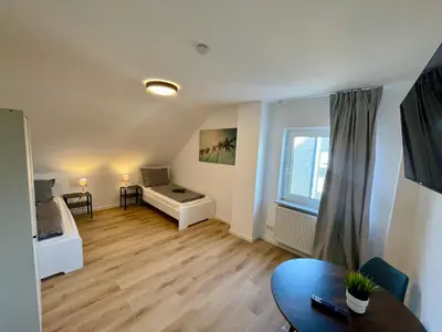 Ein Bett oder Betten in einem Zimmer der Unterkunft Moderne Monteur- und Familienwohnung auf Zeit in Remscheid Süd