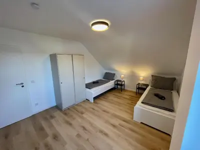 Ein Bett oder Betten in einem Zimmer der Unterkunft Moderne Monteur- und Familienwohnung auf Zeit in Remscheid Süd