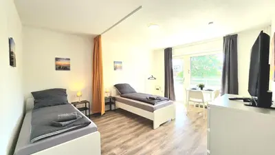 Ein Sitzbereich in der Unterkunft Modern 2-Room Apartment with Free Parking & Free Wi-Fi in Iserlohn - SW01