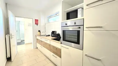 Küche/Küchenzeile in der Unterkunft Modern 2-Room Apartment with Free Parking & Free Wi-Fi in Iserlohn - SW01