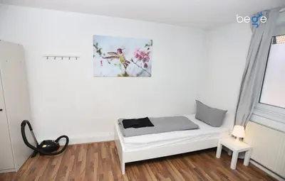 Ein Bett oder Betten in einem Zimmer der Unterkunft BEGE APARTMENTS StayForWork