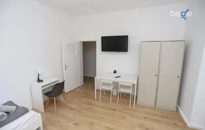 TV/Unterhaltungsangebot in der Unterkunft BEGE APARTMENTS WorkBase