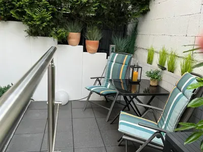 Ein Balkon oder eine Terrasse in der Unterkunft Lovely Souterrain Apartment