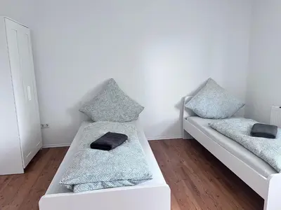 Ein Bett oder Betten in einem Zimmer der Unterkunft estrella24 LIVING ROOMS Seoul