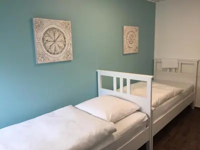 Ein Bett oder Betten in einem Zimmer der Unterkunft Monteur-Zimmer Winter