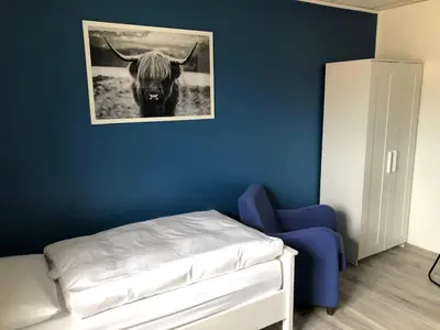 Ein Bett oder Betten in einem Zimmer der Unterkunft Monteur-Zimmer Winter