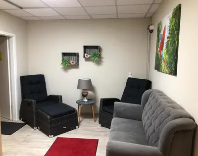 Ein Sitzbereich in der Unterkunft Monteur-Zimmer Winter