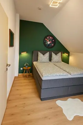 Ein Bett oder Betten in einem Zimmer der Unterkunft Dimi Living Oberhausen & mit Küche