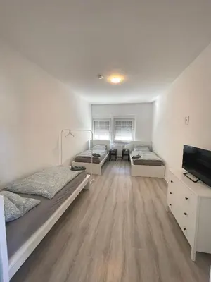 Ein Bett oder Betten in einem Zimmer der Unterkunft Gemütliches Apartment Hagen