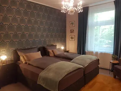 Ein Bett oder Betten in einem Zimmer der Unterkunft Einführungspreis Gemütliche Auszeit - Designwohnung - 4 Sterne Hotelboxspringbetten - Küche - Familie - Erdgeschoss