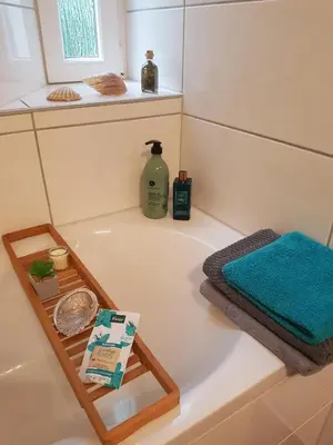 Ein Badezimmer in der Unterkunft Einführungspreis Gemütliche Auszeit - Designwohnung - 4 Sterne Hotelboxspringbetten - Küche - Familie - Erdgeschoss