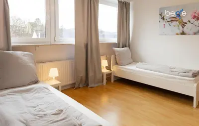 Ein Bett oder Betten in einem Zimmer der Unterkunft BEGE APARTMENTS ProWork Living