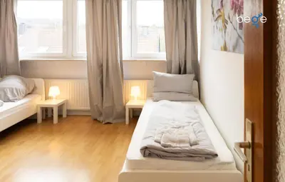 Ein Bett oder Betten in einem Zimmer der Unterkunft BEGE APARTMENTS ProWork Living