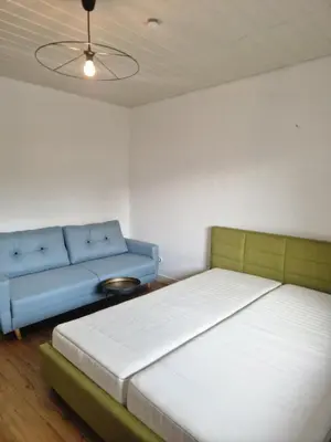 Ein Bett oder Betten in einem Zimmer der Unterkunft Apart Hannover Hemmingen