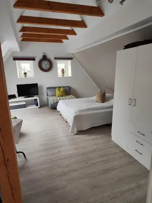Ein Bett oder Betten in einem Zimmer der Unterkunft FeWo Overberge