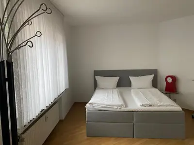 Ein Bett oder Betten in einem Zimmer der Unterkunft City Center Apartment 44